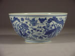 Kangxi blue & white bowl painted on the exterior with a panoramic scene depicting cranes in a lotus pond marked Xing Lin Chun Yan, translated as Spring Banquet in the Apricot Forest