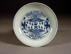 An Imperial mark & period Daoguang blue and white saucer dish decorated with phoenix birds