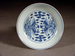 An Imperial mark & period Yongzheng blue and white saucer dish decorated with phoenix birds