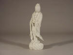 A large standing 19th C Dehua Blanc de Chine figure of Guanyin holding a scroll