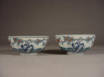 康熙 A Pair of Kangxi doucai bowls with blossoming peach tree