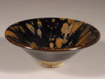 A fine Song Cizhou type russet splashed partridge feathers conical black glazed bowl