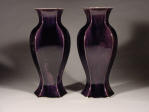 A pair of magnificent Kangxi aubergine glazed hexagonal form baluster vases with foliate rims