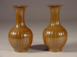 A Pair of Qianlong Foliate Vases with Cafe au lait glaze