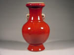 A 乾隆 Qianlong Red Flambe Glazed Baluster Vase with Elephant Handles