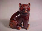 A 乾隆 Qianlong Aubergine Glazed Model of a Cat