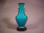 康熙 Kangxi Peacock Blue Facetted Baluster Vase with Dragon Handles